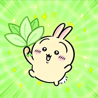 キラキラ光る背景で嬉しそうに葉っぱを持つうさぎのプロフィール画像