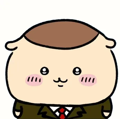 スーツ姿に赤いネクタイで微笑むくりまんじゅうの可愛いSNSアイコン