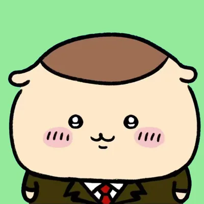 スーツに赤いネクタイを締めた可愛らしいくりまんじゅうのプロフィール画像