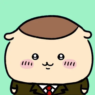 スーツとネクタイを着て頬を赤らめるくりまんじゅうの可愛いアイコン